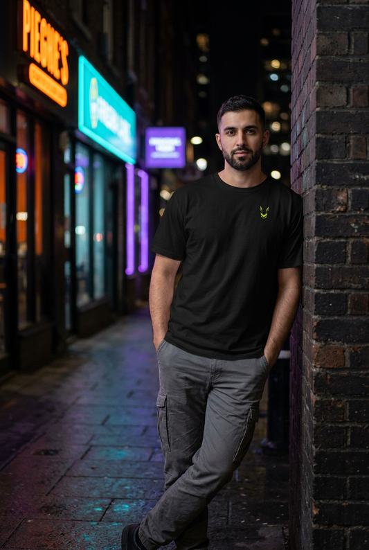 Man leaning against wall, front view